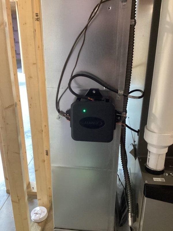 Responded to no-heat service call for Lennox furnace (<10 years old) with thermostat displaying C-2 error code and no air flow. Diagnosed issue as loose connection between thermostat wiring and terminal prongs. Replaced existing thermostat with customer-supplied unit, ensuring proper connections, and verified complete system operation. System now functioning properly.