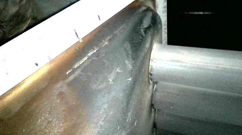 Responded to service call for a leaking furnace. Identified multiple issues including water accumulation in mechanical room and plugged venting system. Cleared obstructed ventilation and documented damaged vent cap that requires replacement on follow-up service visit.