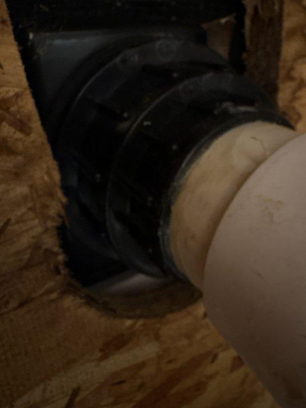Upon inspection, determined that the reported toilet leak was actually coming from the shower drain. Tightened loose shower drain and applied caulking around the base to resolve the slow leak issue.