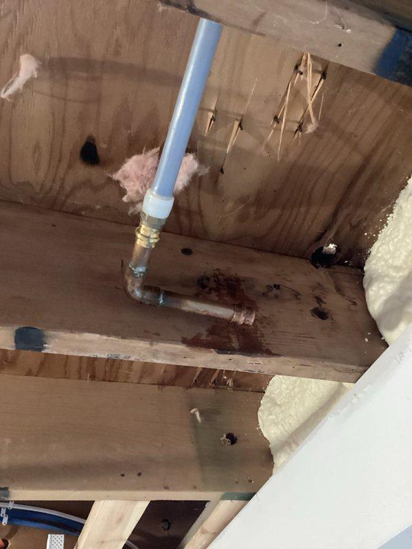Disconnected hot water baseboard heating system in living room area as requested for remodeling work. Properly capped off supply and return lines after isolation. All other heating zones remain operational while this section undergoes renovation.