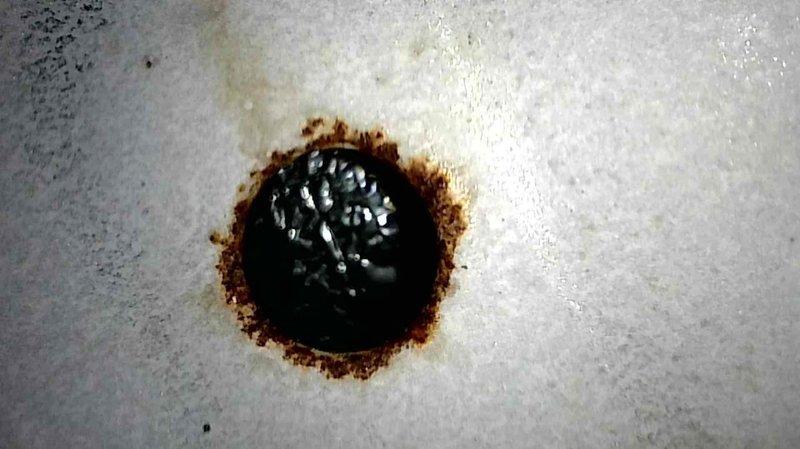 Responded to a no-heat call for a 25-year-old Lennox G50 LP furnace. Diagnosed plugged burners and significant rust on the heat exchanger, particularly around eyelets. Critical issue identified: large hole in ventilation system that requires immediate replacement. Documented issues with photographs including corrosion damage. Service advisor scheduled to provide estimate for replacement furnace.