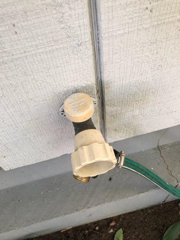 Replaced damaged frost-proof Prier hose bibb due to broken handle and sheared screw in stem. Installed new assembly with Y-splitter, ensuring proper connection and functionality. Unit now operates correctly with both water outputs accessible via dual control knobs.