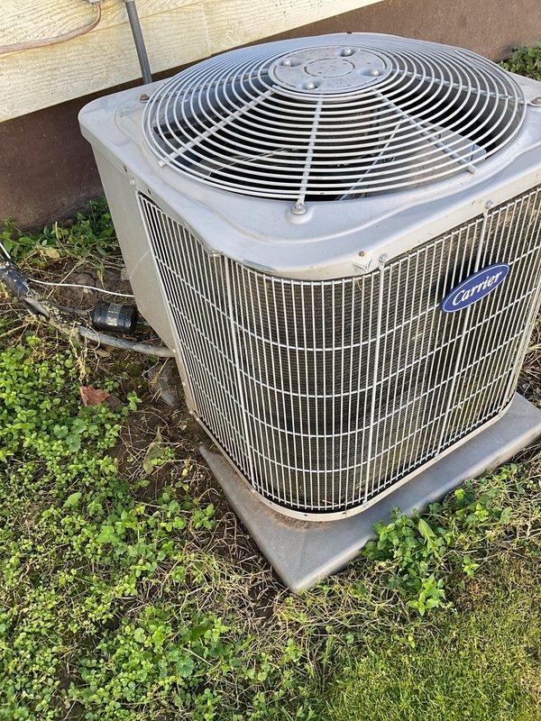 Inspected damaged Carrier outdoor condensing unit (Model 24ABB324A0033010, 2 Ton, 208-230V, R-410A) where top corner, fan grill and top cover were damaged by contractor. Documented damage with photos, completed parts order form for replacement components, and confirmed payment responsibility with contractor Anthony who has approved parts ordering with CC on file.