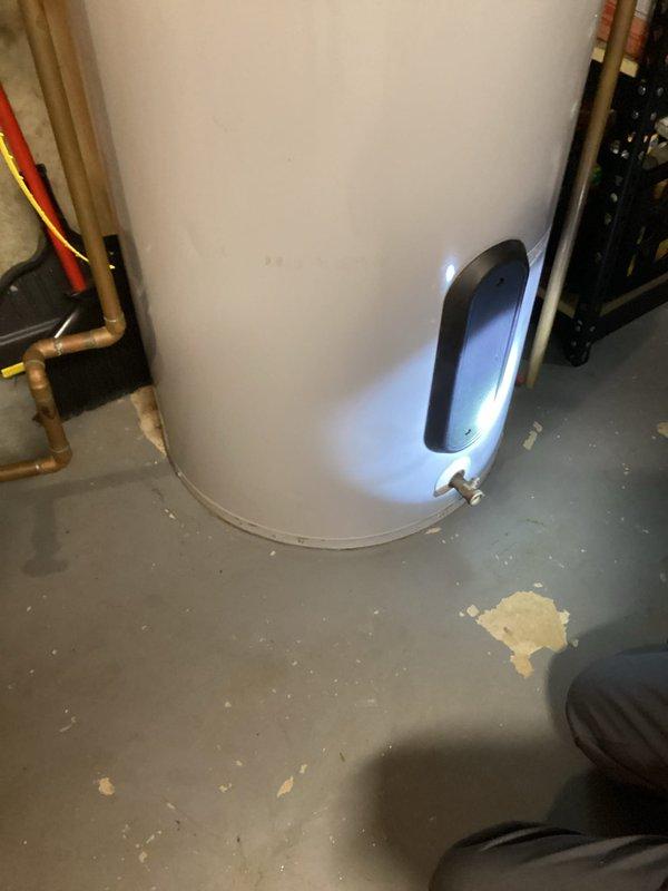 Responded to service call for American 80-gallon water heater with reported leak. Upon inspection, determined water was leaking from the tank itself, not just the bottom element cover as initially reported. Due to tank integrity failure, recommended replacement of unit and provided customer with options for new water heater installation.