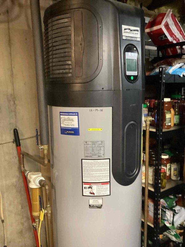 Responded to service call for American 80-gallon water heater with reported leak. Upon inspection, determined water was leaking from the tank itself, not just the bottom element cover as initially reported. Due to tank integrity failure, recommended replacement of unit and provided customer with options for new water heater installation.