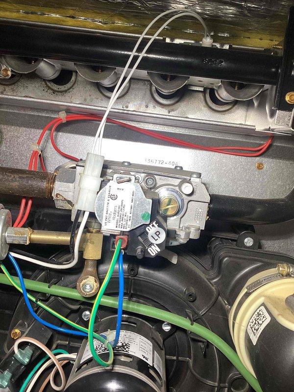 Responded to no heat complaint for 4-year-old LP furnace with failed ignition code. Diagnosed sticking gas valve solenoid by confirming proper igniter operation and 24V to valve without opening. Temporarily restored operation by tapping valve and cycling switch. Recommended gas valve replacement as permanent solution and advised customer on future tune-up service during same visit.