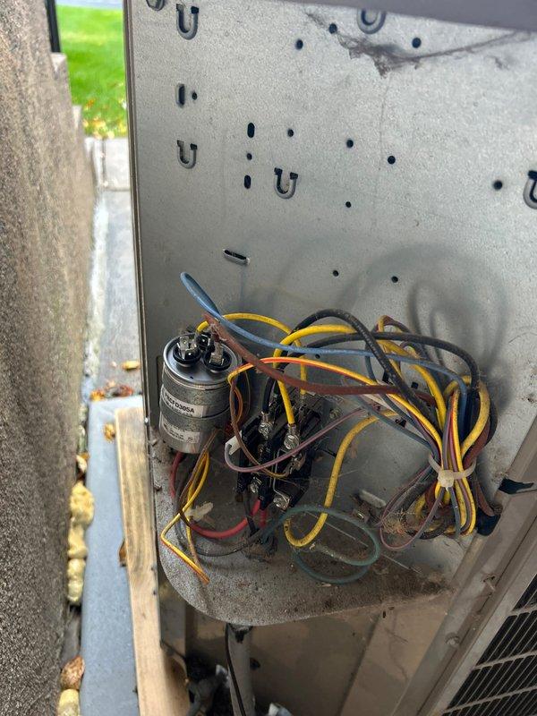 Diagnosed and repaired 10-year-old HVAC system that was failing to cool properly. Investigation revealed a faulty capacitor preventing the outdoor condensing unit from operating correctly. Replaced the defective capacitor and verified proper system operation with post-repair diagnostics showing appropriate refrigerant pressures (100.3 PSI suction, 151.5 PSI liquid).