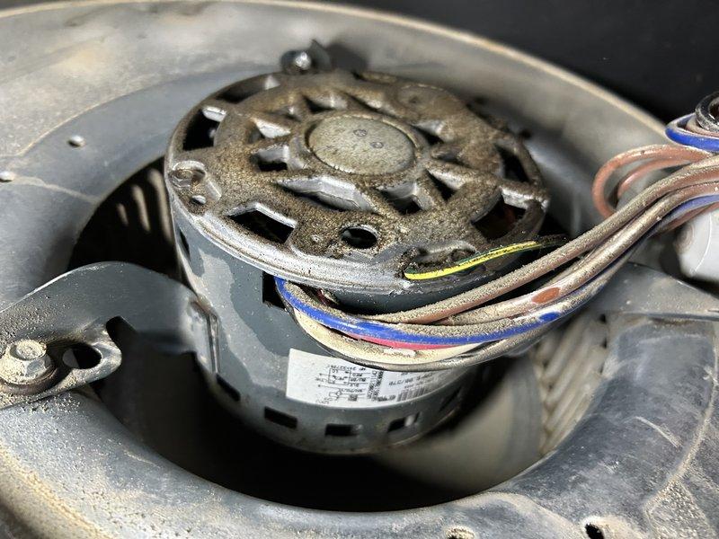 Performed biannual maintenance agreement service on 21-year-old HVAC system. Conducted operational furnace inspection with temperature measurement, filter replacement, and drain cleaning. Found several deficiencies requiring repair including secondary heat exchanger leakage at joints, oil-leaking blower motor with dirty wheel, and broken drain kit nipple currently secured with silicone. Arranged for service advisor follow-up to discuss necessary repairs.