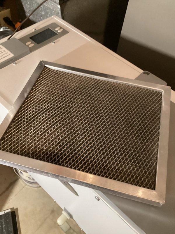 Performed comprehensive annual furnace tune-up including inspection of heat exchanger via camera, verification of all safety components (pressure switch, limit switches, flame sensor, igniter), and combustion air/gas pressure testing. Replaced air filter, reset dehumidifier filter reminder, and adjusted humidifier settings for winter operation. System functioning properly with normal operation verified.