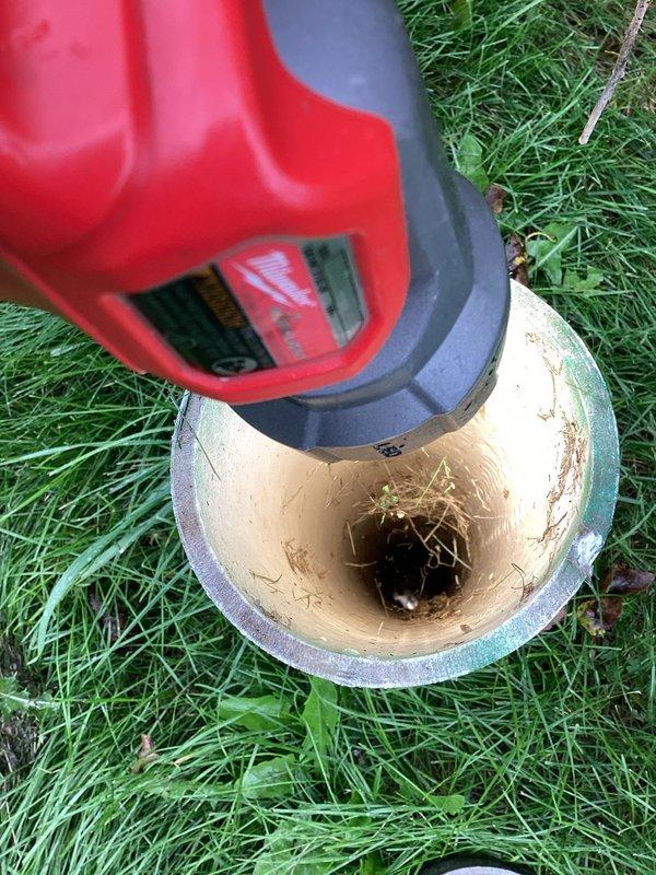 Responded to alarm activation in customer's basement. Upon inspection, determined the alarm was associated with the septic system, not the sump pump. Found drain field saturated causing the septic alarm to trigger. Customer was referred to a septic specialist for further assistance.