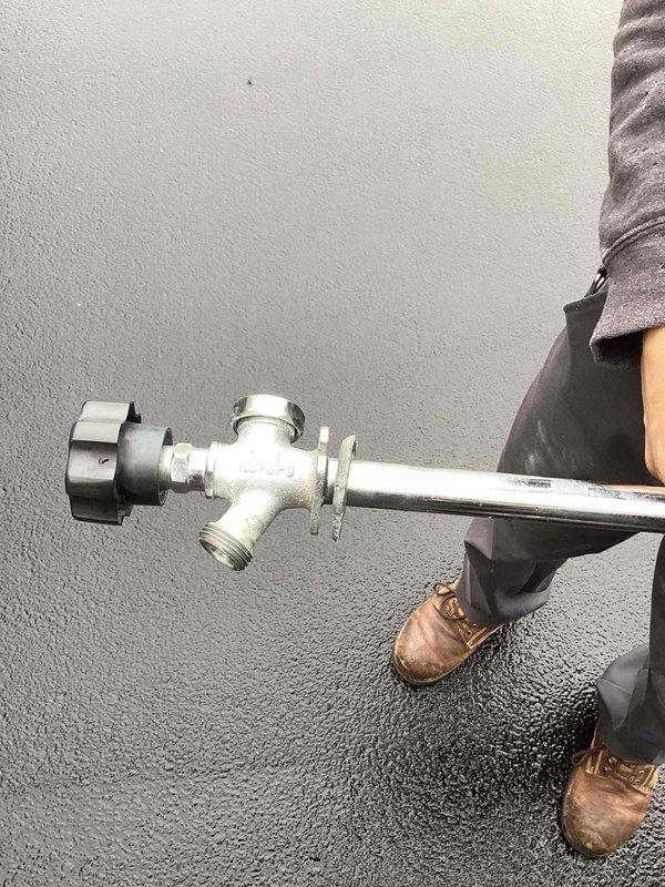 Responded to service call regarding leaking kitchen sink. Diagnosed issue with faulty kitchen faucet sprayer. Advised homeowner to contact Monan for sprayer replacement. Also serviced exterior hose bibb connection, collecting drips in metal basin to prevent water damage while completing repair. Responded to service call regarding leaking kitchen sink. Diagnosed issue with faulty kitchen faucet sprayer. Advised homeowner to contact Monan for sprayer replacement. Also serviced exterior hose bibb connection, collecting drips in metal basin to prevent water damage while completing repair.