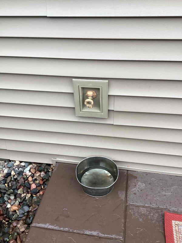 Responded to service call regarding leaking kitchen sink. Diagnosed issue with faulty kitchen faucet sprayer. Advised homeowner to contact Monan for sprayer replacement. Also serviced exterior hose bibb connection, collecting drips in metal basin to prevent water damage while completing repair. Responded to service call regarding leaking kitchen sink. Diagnosed issue with faulty kitchen faucet sprayer. Advised homeowner to contact Monan for sprayer replacement. Also serviced exterior hose bibb connection, collecting drips in metal basin to prevent water damage while completing repair.