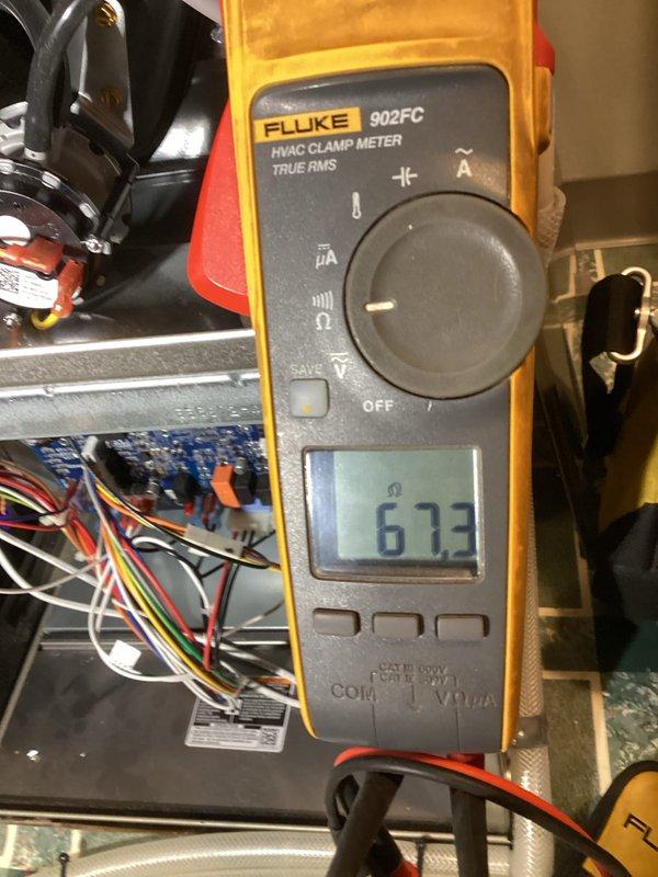 Performed comprehensive natural gas furnace maintenance including system evaluation, heat exchanger inspection, component testing (blower, inducer, safety mechanisms, flame sensor, igniter), and gas pressure verification. Conducted thorough inspection of venting system and exhaust flue. Tested system operation at multiple capacities, confirming proper functionality with readings verified using Fluke 902FC meter. System currently operating normally.
