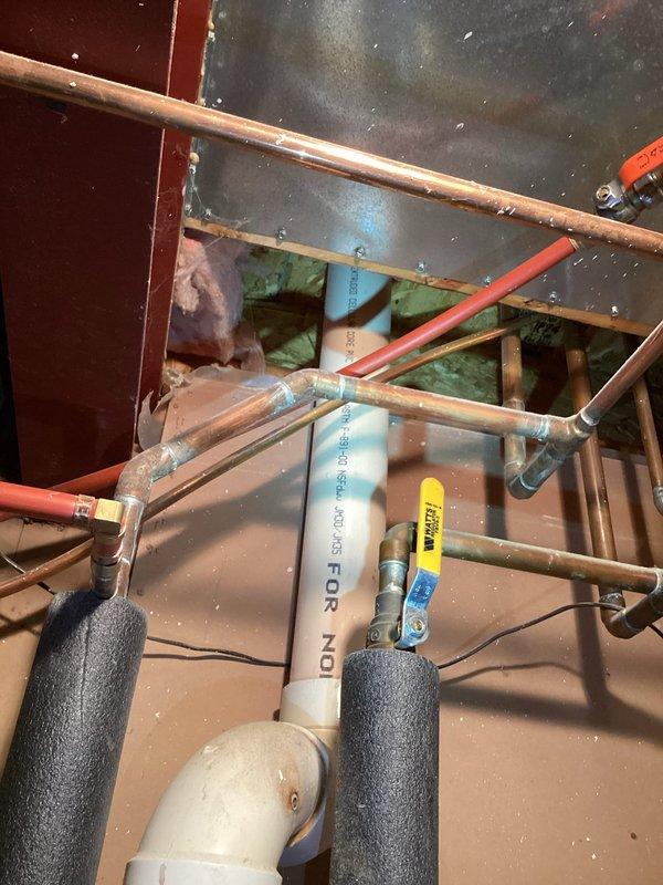 Diagnosed and identified 21-year-old 40-gallon A.O. Smith power vent water heater with active tank leak requiring full replacement. Noted existing cellular core vent piping that would not meet current code requirements during inspection, with potential need for complete re-venting to roof. Customer presented with replacement options and advised of possible additional venting work pending inspection outcomes.