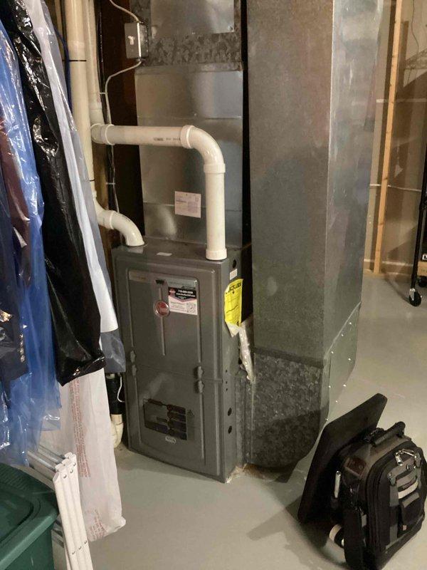 Performed comprehensive annual furnace maintenance per membership agreement including cleaning condensate drain, trap, flame sensor and spark rod igniter. Inspected heat exchanger (good condition), verified proper operation in both first and second stage firing sequences with no issues detected, and replaced air filter. System is functioning normally with no operational concerns identified.