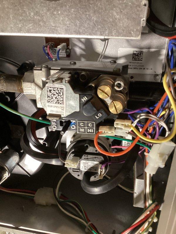 Performed warranty repair on heating system by replacing failed 2-stage gas valve. Verified proper system operation by testing burners, safety switches, gas pressures, combustion air, and wiring connections. Unit successfully cycled through both high and low heat modes and is now functioning normally.