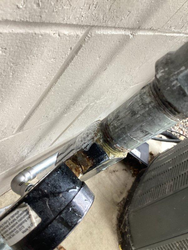 Conducted re-inspection with White Bear Township officials for generator installation, which received final approval. Completed system setup including purging gas lines, configuring settings, setting system to auto mode, and verifying proper operation of generator and garage heater. Documentation includes photos of gas line connections and pressure gauge reading approximately 50-60 PSI.