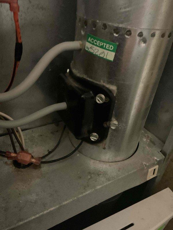 Completed 2-hour repair of HVAC system by installing new inducer motor, secured parts from WC Johnstone. Additionally installed outdoor air temperature sensor (OAT) to ensure proper system operation. Verification photo shows properly installed inducer motor with acceptance tag, confirming successful completion of the repair as sold by Roger.