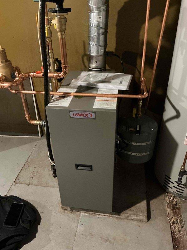 Addressed radiator heating issue on recently installed boiler system by adjusting bypass valve and increasing pump speed to restore proper heat flow to sunroom radiator. Performed complete boiler inspection which revealed no additional issues except a leaking ball valve from previous system. Discussed remediation options for the valve leak with customer.