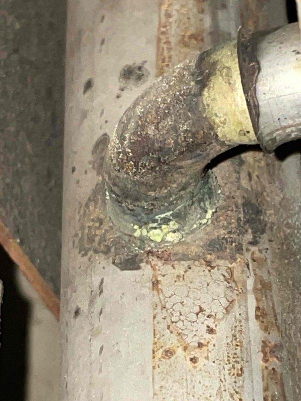 Performed tune-up on Lennox Pulse furnace exhibiting intermittent operation. Diagnostic testing revealed pressure loss of approximately 1 PSI over 10 minutes and green corrosion on secondary heat exchanger. Determined heat exchanger failure is unrepairable on this model. System tagged for replacement and scheduled advisor consultation for next day.