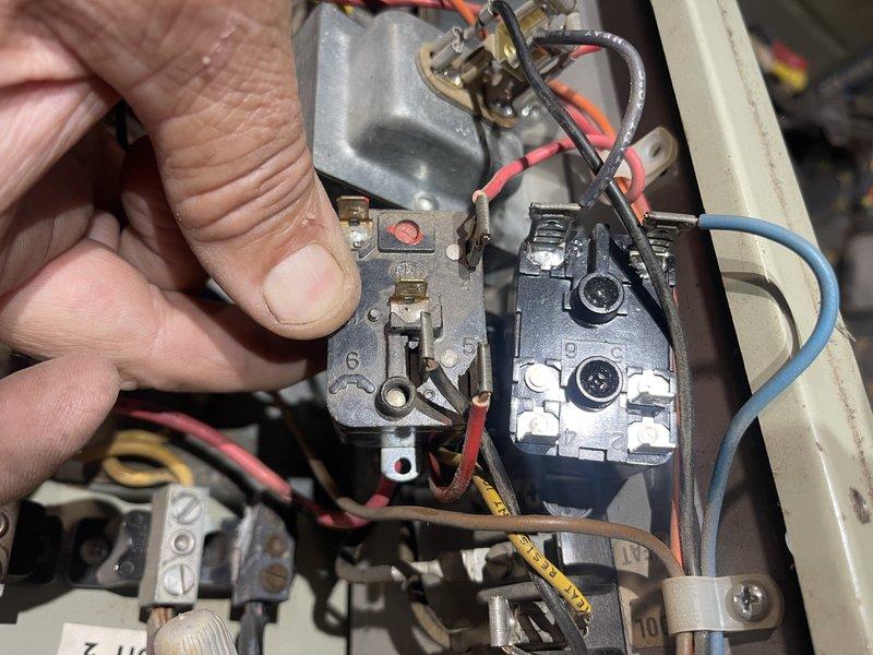 Diagnosed and repaired electric furnace issue where blower fan was running continuously. Found stuck relay in the electric furnace that prevented proper termination of airflow when using wood heat. Replaced faulty relay and secured damaged wiring for unused second stage heat circuit by turning off the associated breaker and taping off burnt wires after confirming with resident that this heating stage was not utilized.