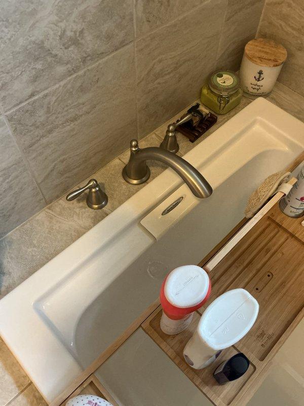 Performed plumbing inspection and resolved two issues: 1) Eliminated sewer odor in laundry room by adjusting washing machine discharge hose position in standpipe to prevent trap siphoning, and 2) Cleared slow lab drain by disassembling pop-up assembly and removing hair buildup to improve drainage efficiency.
