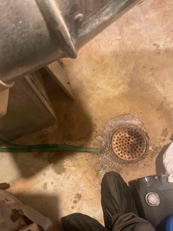 Responded to IAQ service call regarding humidity issues and window condensation. Found dirty air filter that had been pulled into the blower compartment due to restriction. Replaced filter and inspected drainage system, noting proper winter valve position on condensate line and confirming floor drain functionality.