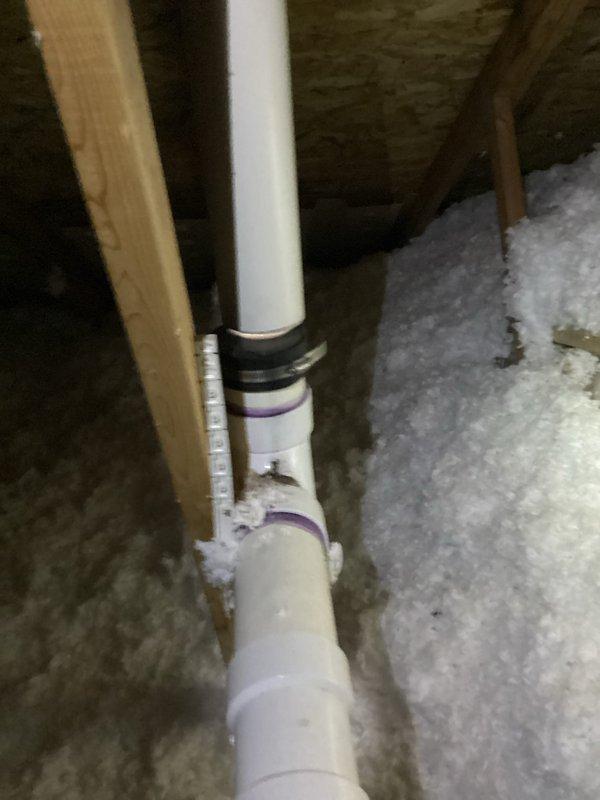 Responded to service call regarding disconnected vent pipe in attic. Located and accessed the attic space where PVC vent stack was detached from roof connection. Successfully reconnected the Charlotte PVC vent pipe to the existing plumbing system, ensuring proper venting of the sewer stack per code requirements.