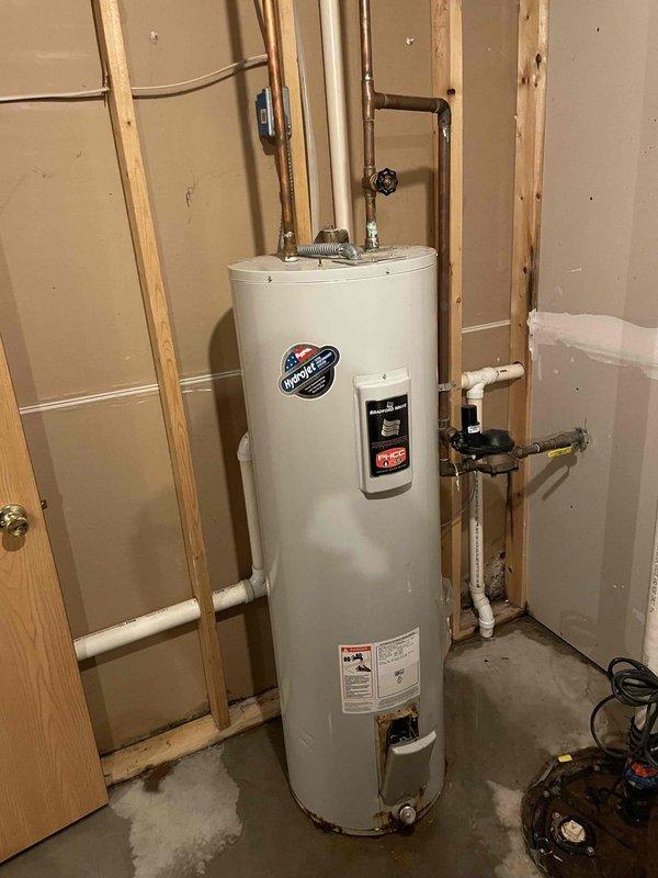 Inspected 20-year-old electric water heater (Bradford White 59-gallon model) and identified active water leakage. Diagnosed unit as irreparable, requiring full replacement. Communicated findings to customer, secured approval for replacement, and scheduled installation for the following day.