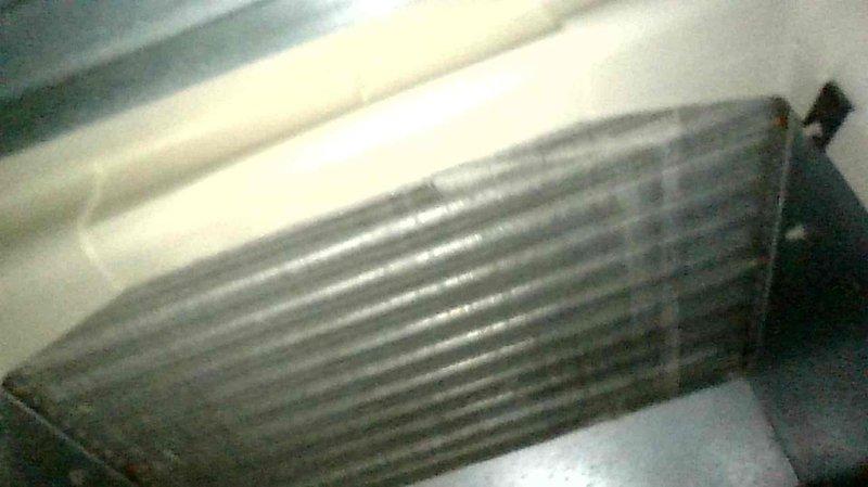 Responded to customer complaint regarding excessive noise from 5-year-old Train furnace during startup. Conducted comprehensive inspection including scope examination of heat exchanger which showed no issues. Identified severe rusting on burners and potential combustion blower problems. Provided customer with replacement options for deteriorated components to resolve the noise issue.