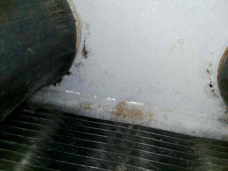 Responded to no heat call and identified rollout switch tripped due to clogged filter. Installed new air filter and reset rollout switch, which temporarily restored furnace operation. Upon inspection, discovered perforations in the heat exchanger at the primary header junction and heavily rusted burners. Tagged equipment as unsafe and scheduled service advisor consultation to discuss heat exchanger and burner replacement options. Responded to no heat call and identified rollout switch tripped due to clogged filter. Installed new air filter and reset rollout switch, which temporarily restored furnace operation. Upon inspection, discovered perforations in the heat exchanger at the primary header junction and heavily rusted burners. Tagged equipment as unsafe and scheduled service advisor consultation to discuss heat exchanger and burner replacement options.