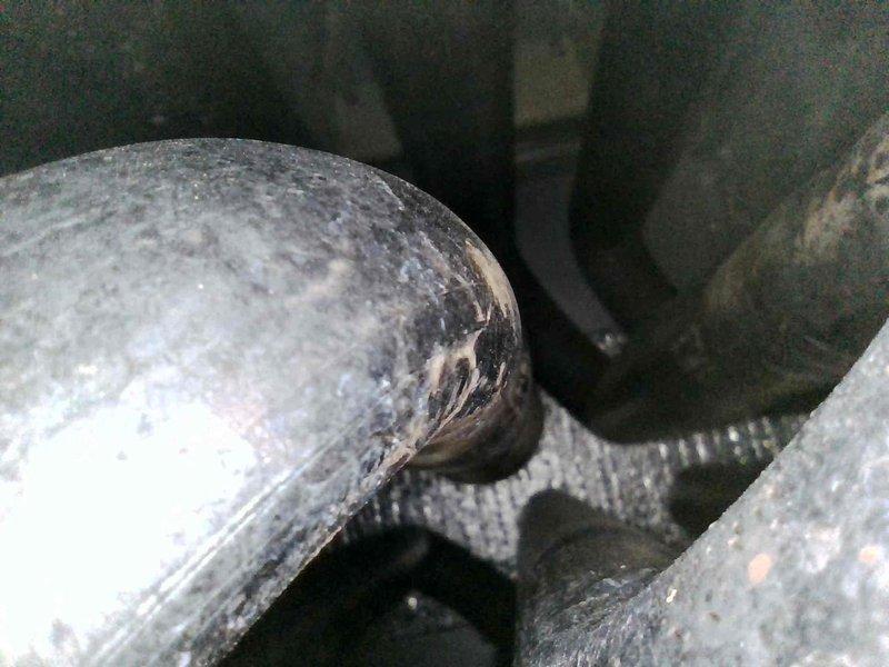 Responded to no heat call and identified rollout switch tripped due to clogged filter. Installed new air filter and reset rollout switch, which temporarily restored furnace operation. Upon inspection, discovered perforations in the heat exchanger at the primary header junction and heavily rusted burners. Tagged equipment as unsafe and scheduled service advisor consultation to discuss heat exchanger and burner replacement options. Responded to no heat call and identified rollout switch tripped due to clogged filter. Installed new air filter and reset rollout switch, which temporarily restored furnace operation. Upon inspection, discovered perforations in the heat exchanger at the primary header junction and heavily rusted burners. Tagged equipment as unsafe and scheduled service advisor consultation to discuss heat exchanger and burner replacement options.