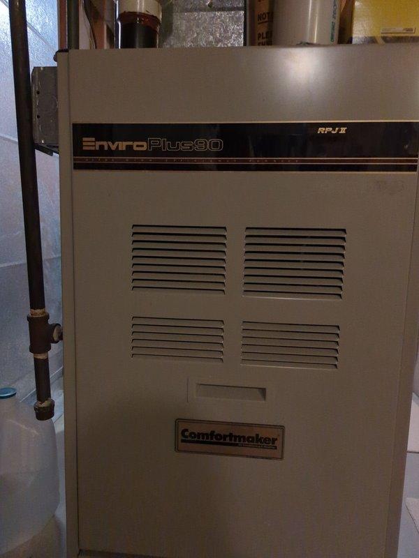 Responded to no heat complaint on Comfortmaker EnviroPlus 90 furnace. Diagnosed dirty flame sensor preventing main burners from igniting despite pilot flame. Removed and cleaned flame sensor, restoring ignition. Noted significant rust on burners causing pronounced ignition flash. Identified secondary heat exchanger leak and inducer motor leaking at seam. Performed visual inspection of heat exchanger by removing blower. Recommended replacement of burners, inducer motor, and heat exchanger. Service advisor scheduled for follow-up. Responded to no heat complaint on Comfortmaker EnviroPlus 90 furnace. Diagnosed dirty flame sensor preventing main burners from igniting despite pilot flame. Removed and cleaned flame sensor, restoring ignition. Noted significant rust on burners causing pronounced ignition flash. Identified secondary heat exchanger leak and inducer motor leaking at seam. Performed visual inspection of heat exchanger by removing blower. Recommended replacement of burners, inducer motor, and heat exchanger. Service advisor scheduled for follow-up.