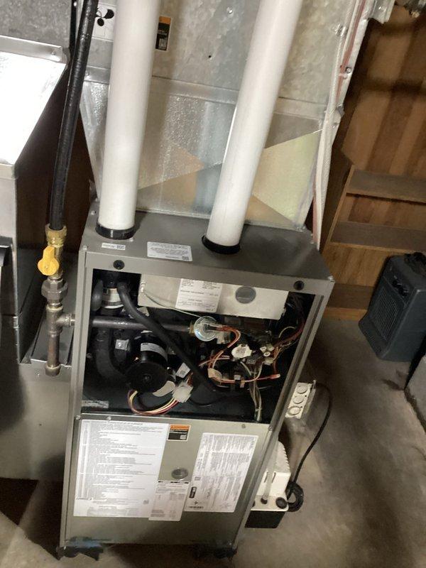 Responded to no heat complaint for 5-year-old furnace with reported fan failure. Diagnostic testing revealed inoperative blower motor. Attempted repair by installing replacement motor control module, but communication failure persisted between module and motor. Submitted parts order for new blower motor and control board to restore system functionality.