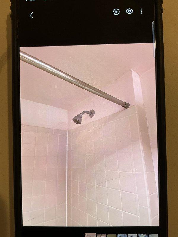 Completed service on multiple plumbing issues including a basement bathtub with a malfunctioning drain latch causing slow drainage and an upstairs toilet with a flush handle that was sticking in the down position, causing continuous tank filling. Inspected both fixtures, documented condition with photos, and performed necessary repairs to restore proper functionality.
