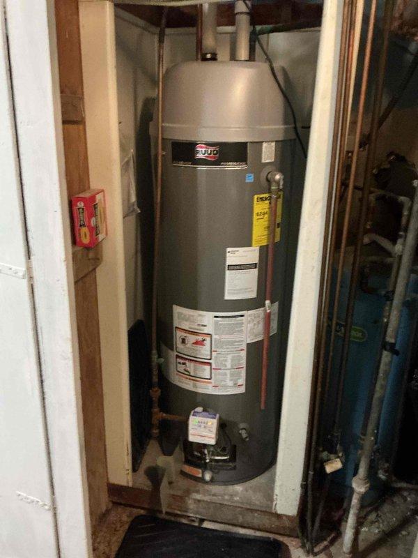 Responded to no hot water complaint for 9-year-old Ruud electric water heater. Diagnostic revealed unit locked out with flammable vapor sensor error code. Attempted sensor replacement but heater remained in lockout state. Recommended full water heater replacement.