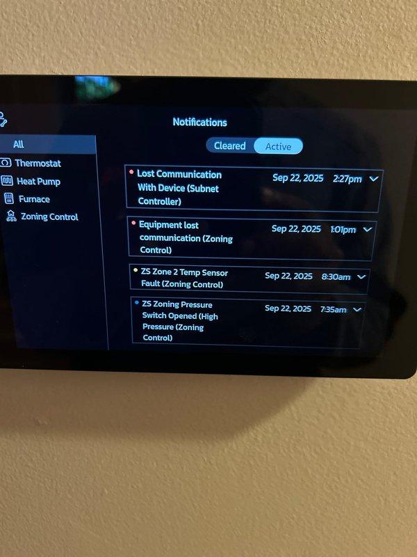 Responded to service call for HVAC system after power outage. Diagnosed multiple communication errors on zoning system indicated by thermostat alerts including "Lost Communication With Device" and "Zone 2 Temp Sensor Fault." Verified electrical connections at control board, confirmed proper power restoration to system components, checked damper functionality, and validated thermostat settings. System now heating properly with all electrical connections secure.