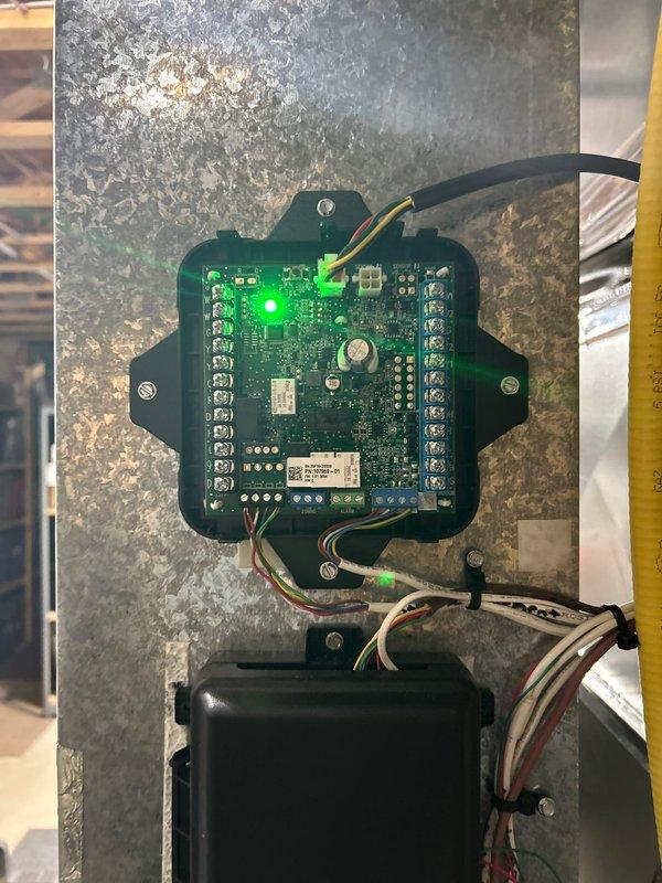 Responded to service call for HVAC system after power outage. Diagnosed multiple communication errors on zoning system indicated by thermostat alerts including "Lost Communication With Device" and "Zone 2 Temp Sensor Fault." Verified electrical connections at control board, confirmed proper power restoration to system components, checked damper functionality, and validated thermostat settings. System now heating properly with all electrical connections secure.