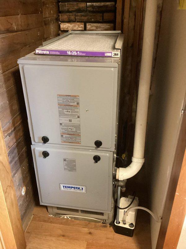 Completed annual maintenance on customer's Tempstar downflow furnace. System checked out in proper working condition with all components operating within normal parameters. Documented garage area for potential future furnace installation per customer's request.