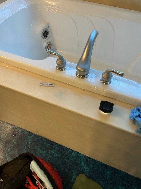 Inspected multi-issue plumbing service call: diagnosed running toilet and low-pressure leaking sink in master bathroom. Identified leaking Roman tub requiring cartridge replacement; however, lacked specialized removal tool necessary for completion. Documented current installation with photographs. Service rescheduled to return with proper equipment.