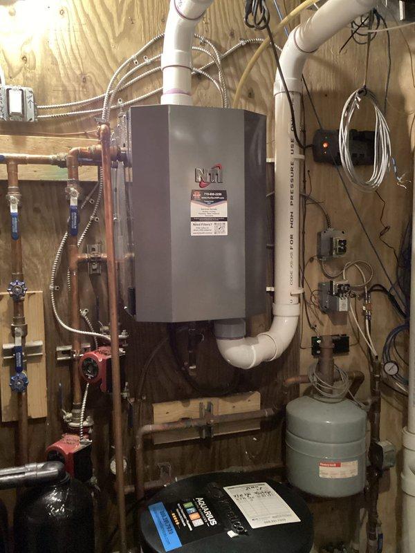 Responded to callback for no heat issue on Rinnai boiler. Diagnosed error code ER4 indicating open stack limit switch. Discovered corroded wiring connection at stack limit switch that was previously identified for replacement but not completed during prior service visit. Temporary repair attempted with limited success. Ordered replacement part to arrive Monday and scheduled urgent follow-up installation before homeowner closing.