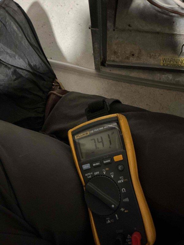 Inspected customer's 25-year-old furnace due to concerns about heat exchanger condition. Confirmed previous technician's findings of excessive rust, temperature stress, and wear where pipes connect to the manifold. Observed heat exchanger showing significant stress that presents a potential safety risk but does not yet warrant immediate condemnation. Tested and cleaned flame sensor which showed weak performance (1-1.7 µA). Scheduled service advisor for new furnace estimate and will provide separate estimate for heat exchanger and flame sensor replacement.