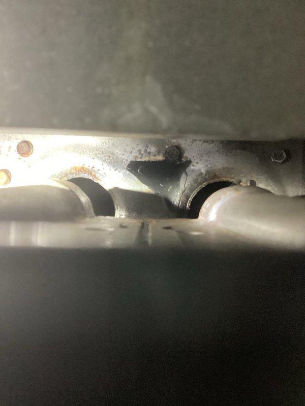 Responded to no-heat service call on a 15-year-old furnace that was only running for 20-30 minutes before shutting down. Diagnostic inspection revealed flames rolling out and tripping the rollout switch, with visible cracks in the heat exchanger near the inlet and on at least one primary cell. Found burner tubes completely plugged with soot, likely caused by incorrect gas pressure or partial exhaust blockage. Recommended replacement options for heat exchanger and complete furnace/AC system, with follow-up appointment scheduled. Responded to no-heat service call on a 15-year-old furnace that was only running for 20-30 minutes before shutting down. Diagnostic inspection revealed flames rolling out and tripping the rollout switch, with visible cracks in the heat exchanger near the inlet and on at least one primary cell. Found burner tubes completely plugged with soot, likely caused by incorrect gas pressure or partial exhaust blockage. Recommended replacement options for heat exchanger and complete furnace/AC system, with follow-up appointment scheduled.