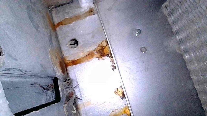 Performed routine maintenance on 22-year-old Gibson furnace and identified failed secondary heat exchanger with visible rust and corrosion along metal seams. Discussed replacement options with homeowner Bennett and provided quote for new heat exchanger. Recommended service advisor assessment for further evaluation.