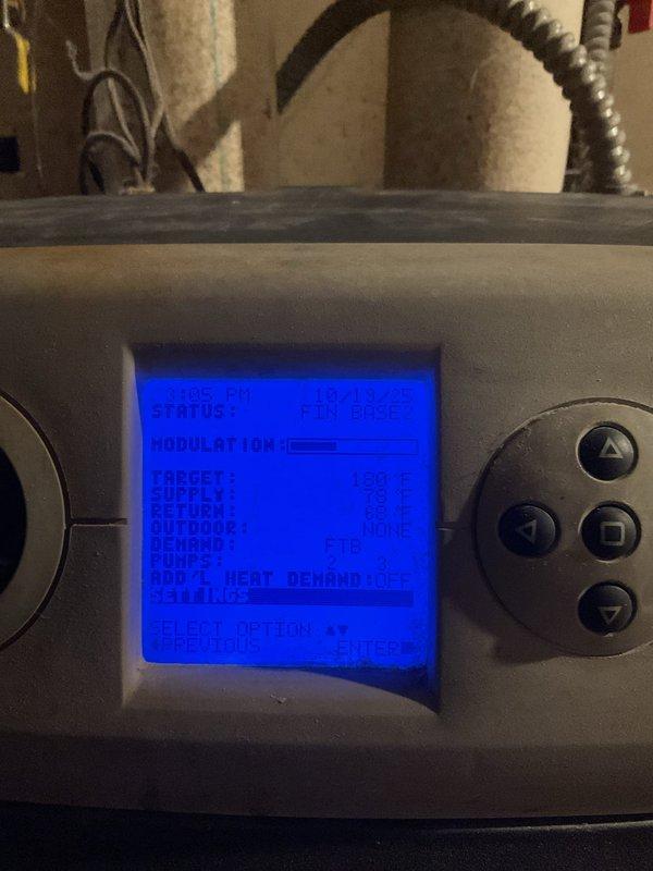 Performed annual boiler maintenance service including heat exchanger cleaning using zip tie method and water spray. Ran diagnostics in both low and high fire modes confirming proper operation. System shows signs of age with moderate debris accumulation in heat exchanger and audible roughness in circulator pump. Verified condensate pump functionality during service.
