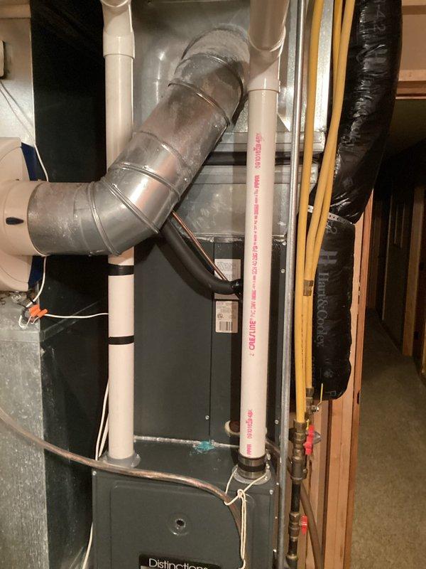 Performed comprehensive furnace tune-up on 14-year-old Distinction HVAC system. Inspection revealed significant rust breakdown on heat exchanger, particularly at burner location. System tests showed elevated carbon monoxide levels during second-stage heating. Recommended replacement of heat exchangers due to safety concerns.
