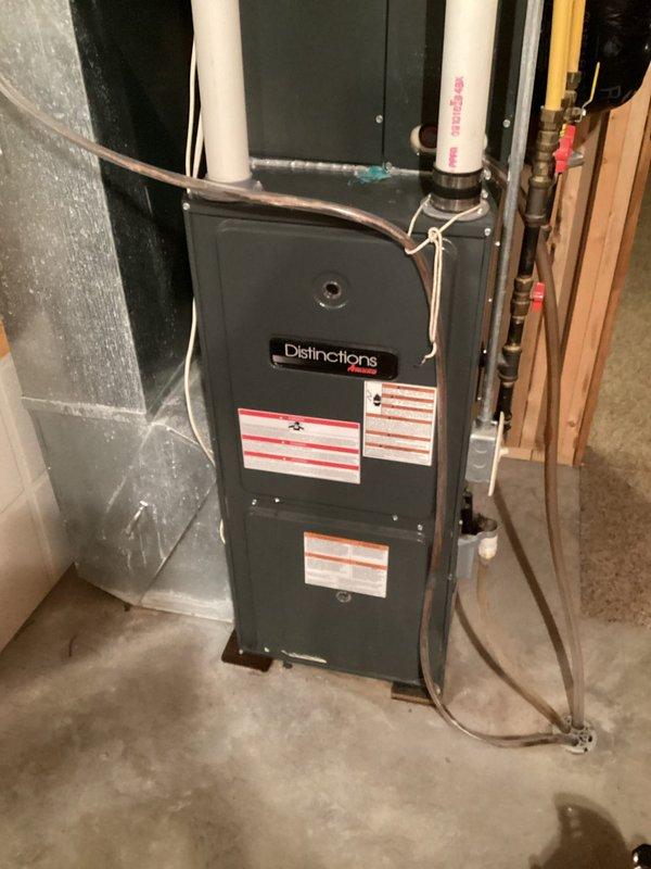 Performed comprehensive furnace tune-up on 14-year-old Distinction HVAC system. Inspection revealed significant rust breakdown on heat exchanger, particularly at burner location. System tests showed elevated carbon monoxide levels during second-stage heating. Recommended replacement of heat exchangers due to safety concerns.