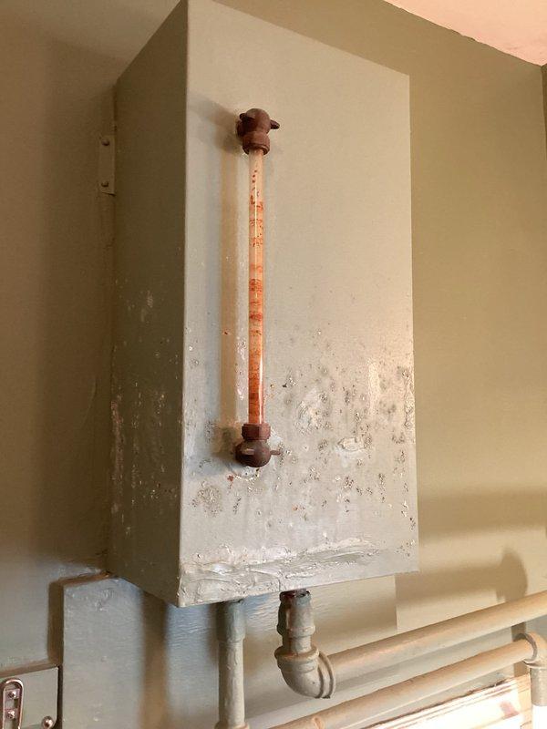 Performed comprehensive boiler tune-up on approximately 30-year-old steam system. Identified leak in expansion tank and elevated carbon monoxide levels in exhaust flue. Adjusted pilot assembly gas pressure and burners to improve combustion efficiency. Recommended equipment upgrade and installation of fresh air intake to mechanical area for improved safety and performance.