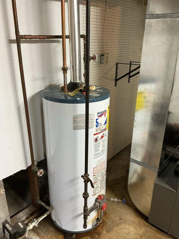 Replaced cracked water heater drain valve that had previously detached twice, causing water to fill the basement. Inspected all connections to ensure proper installation and prevent future leakage.