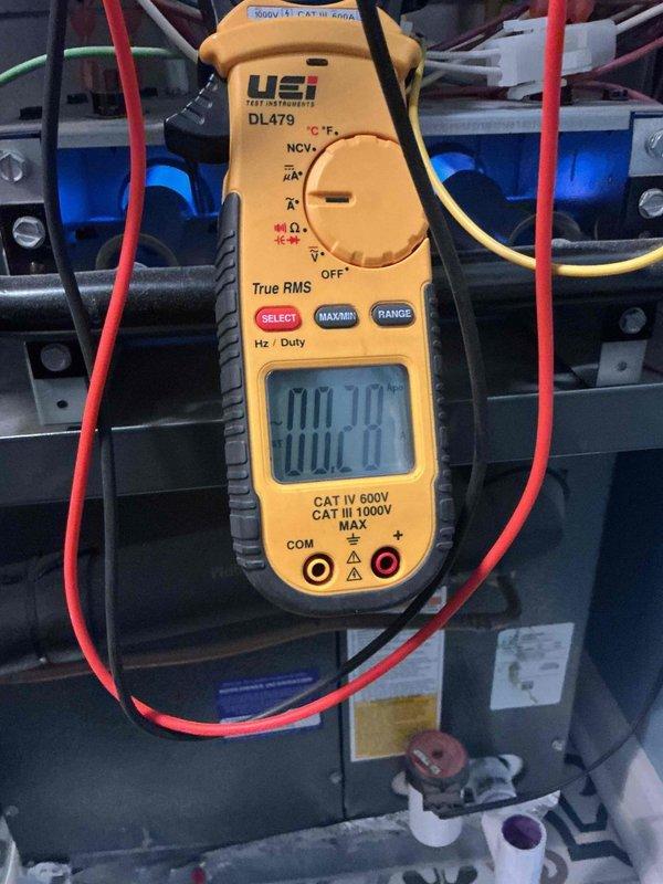 Responded to no heat complaint on 7-year-old Daikin furnace that was lighting but immediately extinguishing. Diagnosed failed flame sensor (reading 0.2 µA) which was not dirty but malfunctioning. Customer supplied replacement sensor which was installed, achieving proper microamp reading of 2.2 µA. System now heating normally after verifying all other components functioning properly.